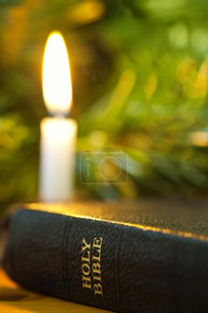 Bible and Christmas Candle
