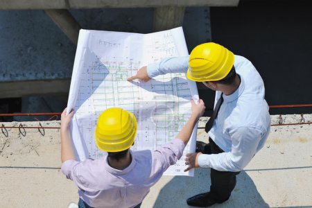 Team of architects on construciton site