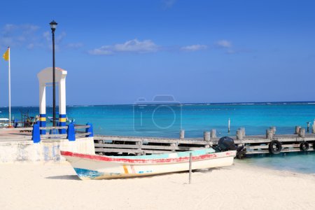 Puerto Morelos beach boat turquoise Caribbean