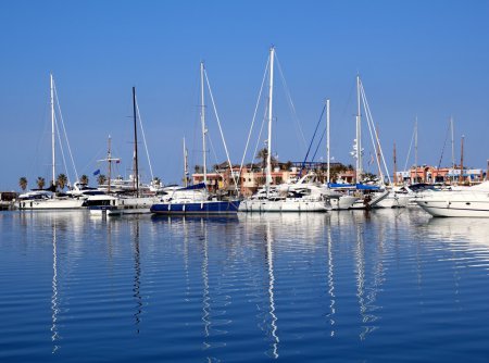 Boats in blue marina Mediterranean sea Denia