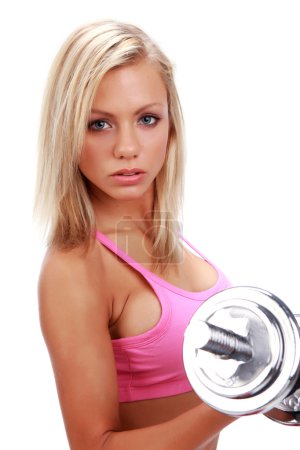 Girl is working out with weights
