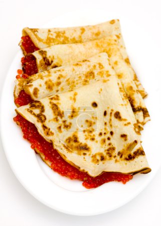 Pancakes with red caviar