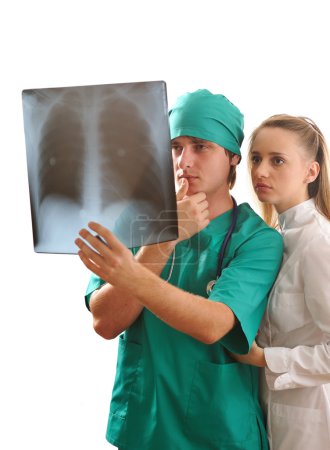 Doctors looking at x-ray