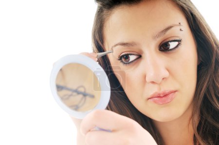 Woman isolated eye brow beauty treatment