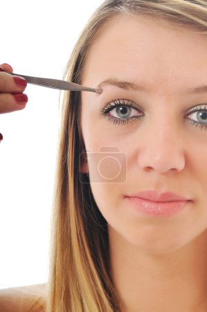 Woman isolated eye brow beauty treatment