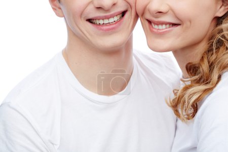 Couple with toothy smiles