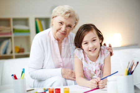 Girl and her grandmother at home