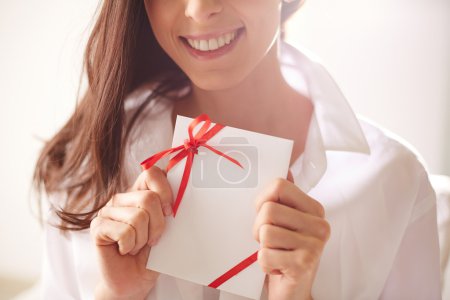 Female holding valentine letter
