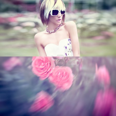Sensual fashion lady in the flowers