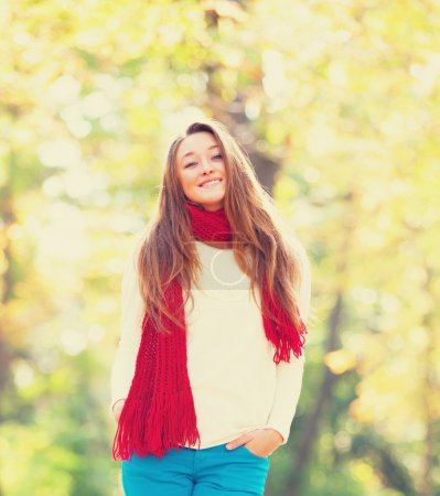 Teen girl in autumn outdoor