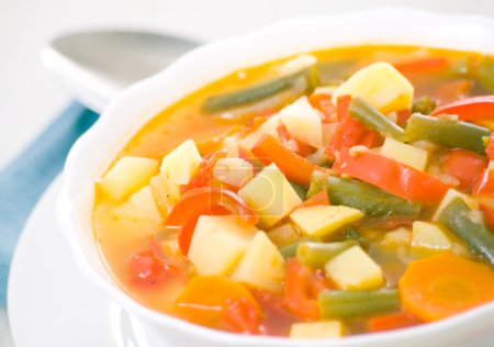 Fresh vegetable soup made of green bean, carrot, potato