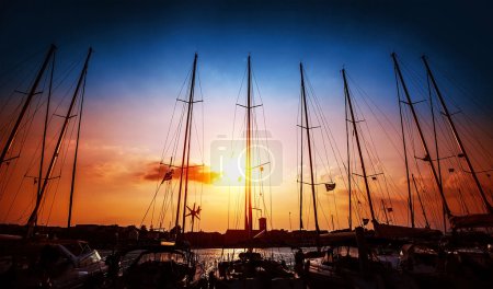 Sailboats on sunset