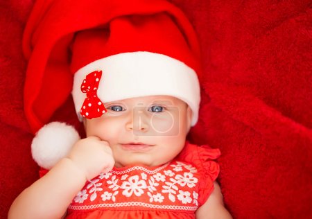 Newborn girl wear Santa hat