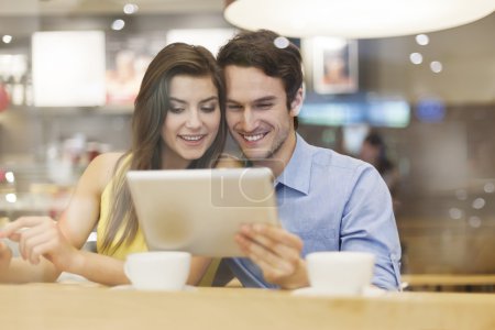 Couple  with digital tablet