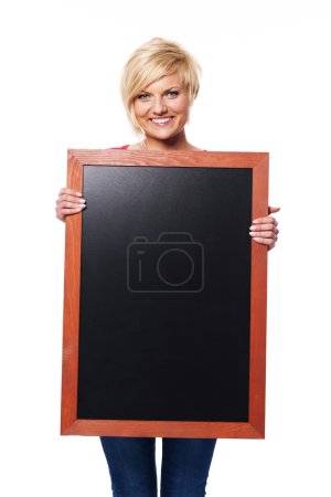 Blonde young female with blackboard
