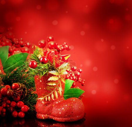 Christmas card with berries and a fir-tree branch