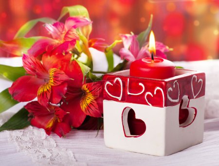 Red candle with heart and flower, a Valentine's Day card