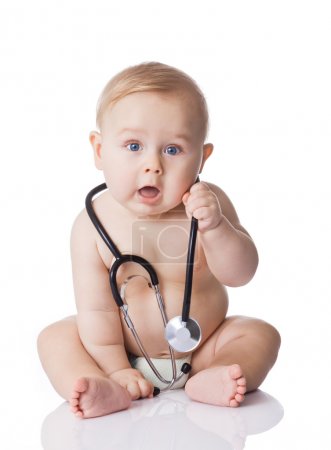 Sweet baby with stethoscope on a white background. Adorable baby