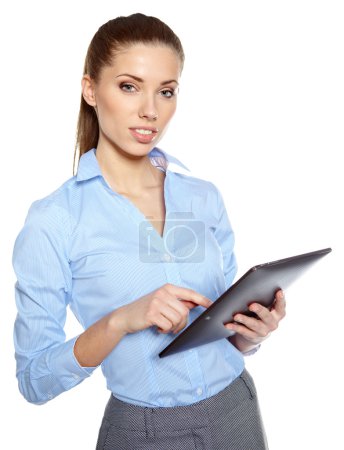 young attractive business woman uses a mobile tablet computer wi