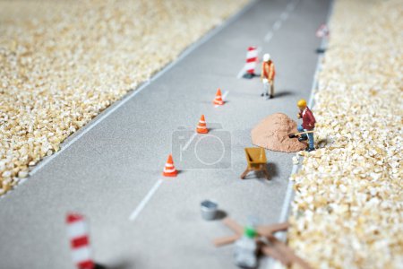 Road renovation in progress . Macro figurine