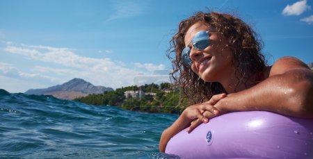 Girl sunbathing on Adriatic waters