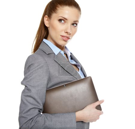 Attractive business woman uses a mobile tablet