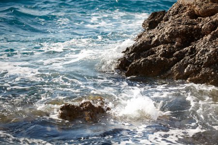 sea rock is breaking powerful wave 