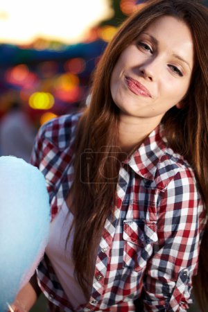 woman with candy floss in the lunapark