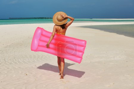 Woman with inflatable raft