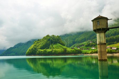 Beautiful emerald mountain lake in Switzerland