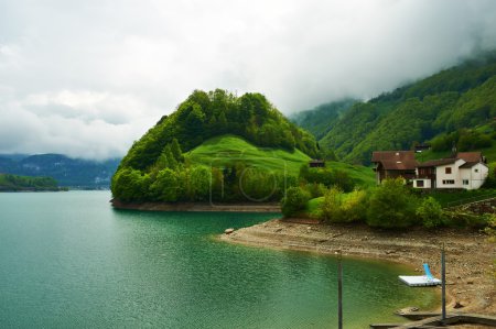 Beautiful emerald mountain lake in Switzerland