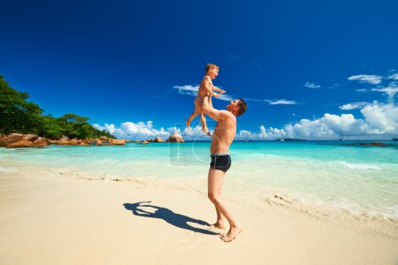 Father and   boy  on beach
