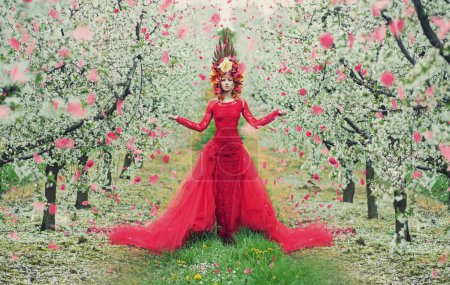 Portrait of the woman in the colorful orchard