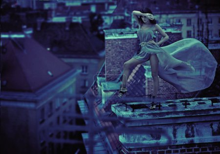 Woman on the roof of the city