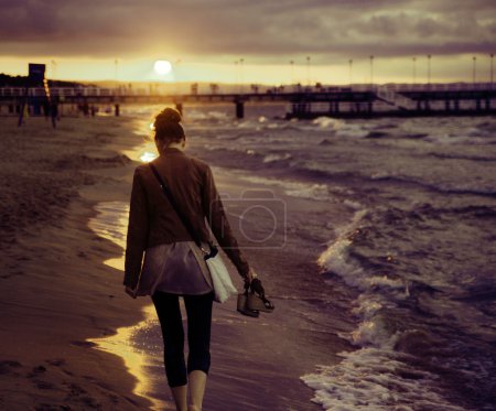 Art picture of woman with the sunset in the background