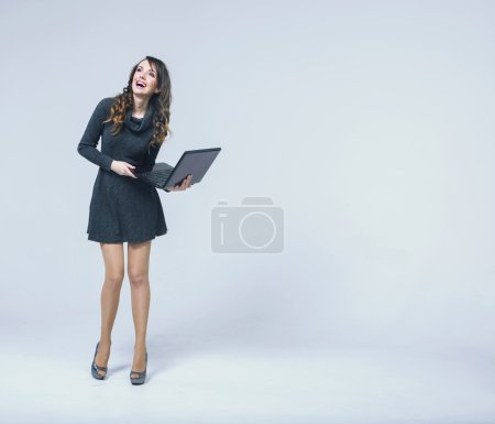 Laughing lady with black notebook