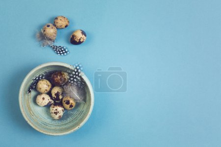 Easter holiday background with quail eggs