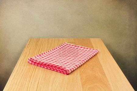 Wooden table with tablecloth