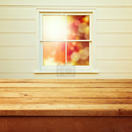 Autumn window with wooden counter