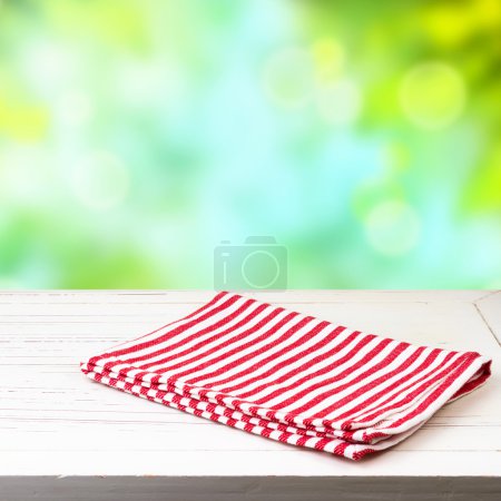 Empty wooden table and tablecloth