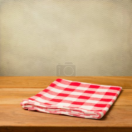 Vintage background with wooden table and tablecloth