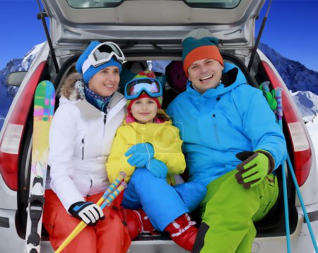 Winter, ski, journey - family with ski equipment