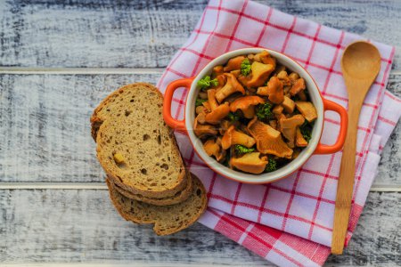 Chanterelle mushrooms cooked in a pan