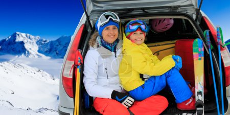 Winter, ski, journey - family with ski equipment