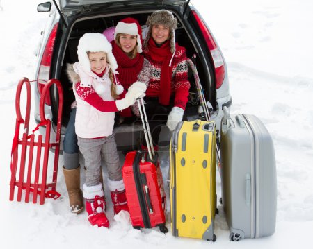 Winter, travel - family with baggage ready for the travel for winter vacation