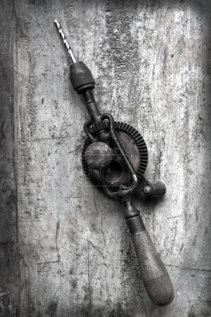 Vintage Hand Drill with Grunge Effects