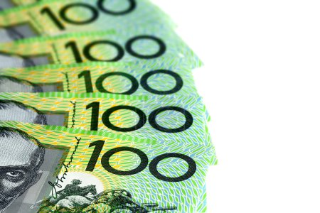 Australian One Hundred Dollar Bills over White