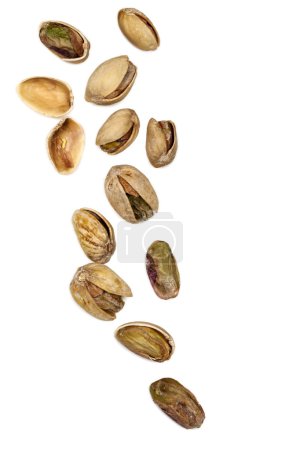 Scattered Pistachios Isolated on White