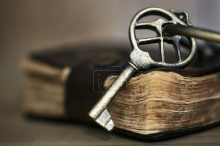 Antique Brass Key on Old Book