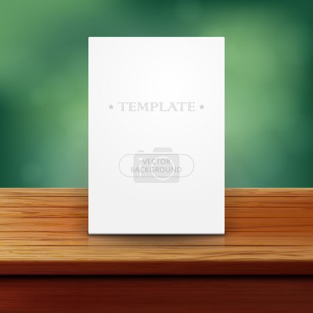 Poster template on wooden table